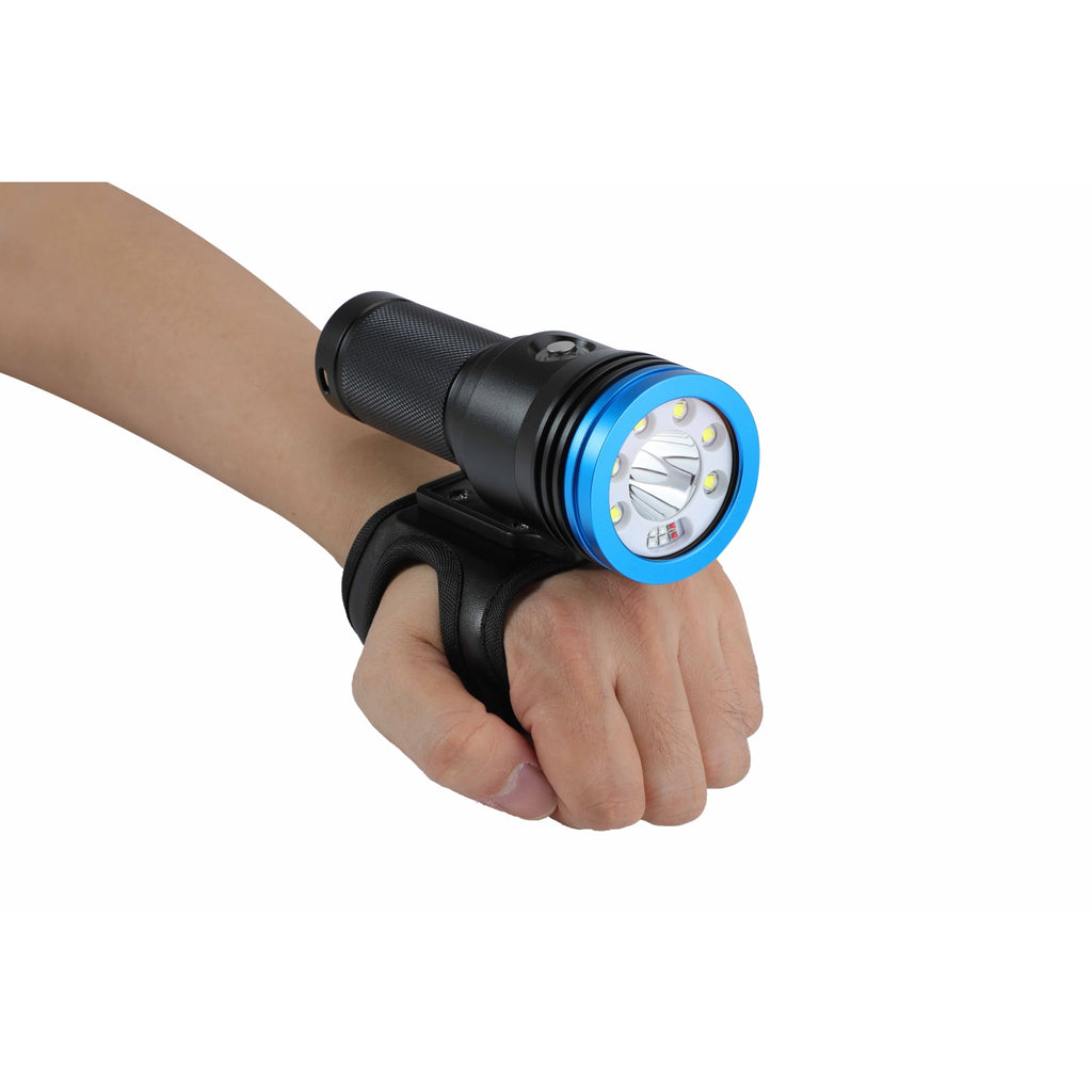 Bigblue VTL4200PB dive light mounted on a soft Goodman glove for handheld underwater use