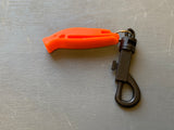 orange safety whistle at Dive Manchester